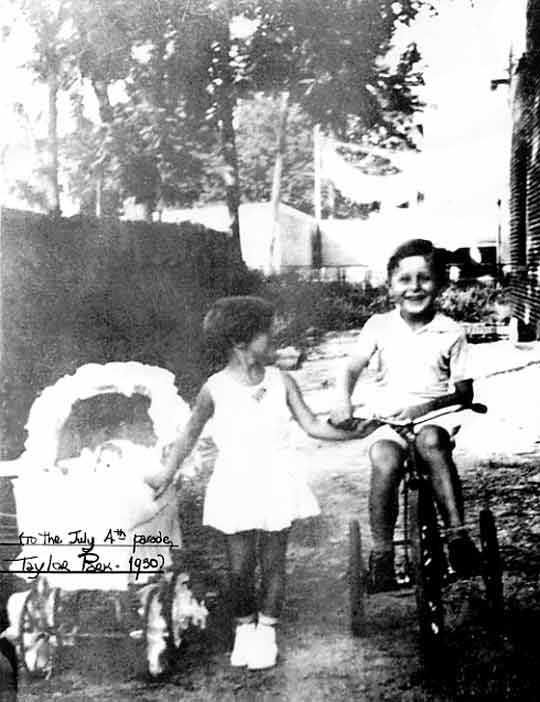 Shirley & me going to the July 4th parade, 1930.